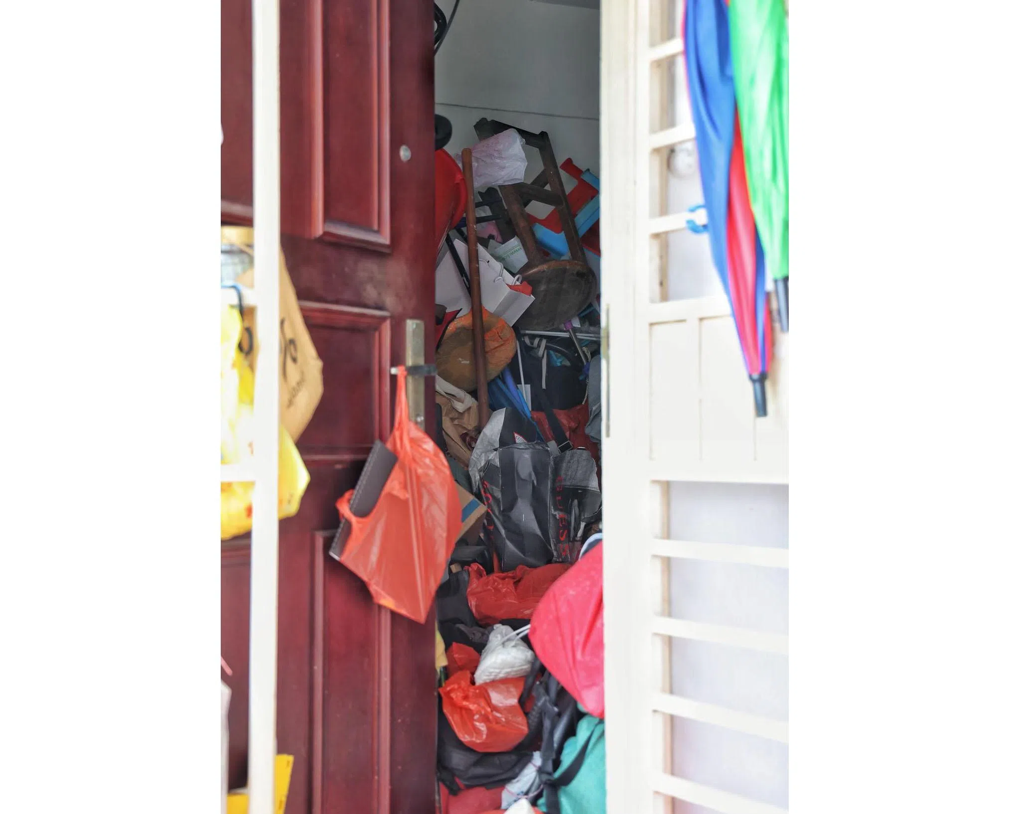 Hoarder's Ang Mo Kio flat so full, its door cannot close